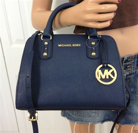 michael kors navy bag small|Michael Kors blue leather bag.